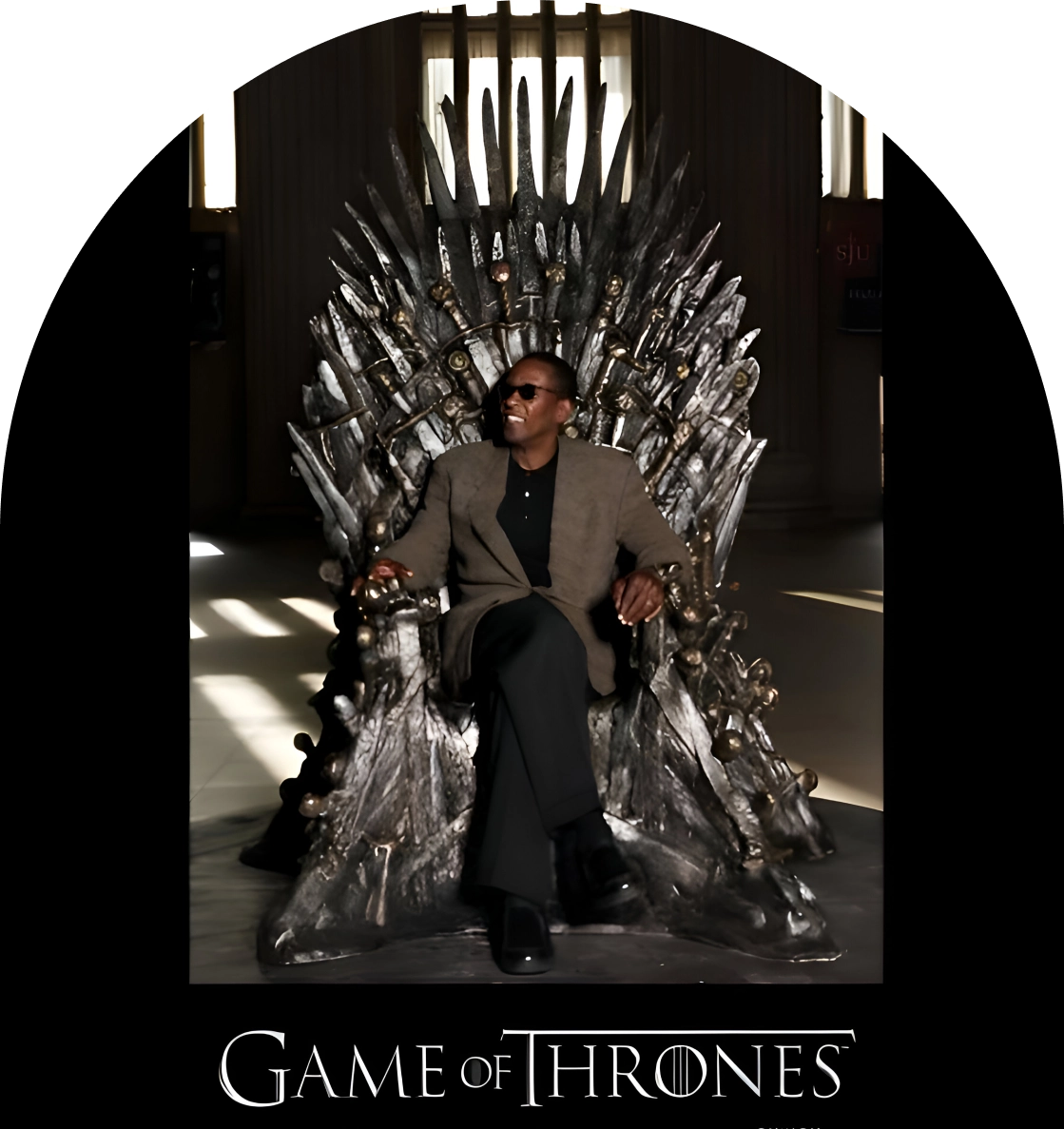 Man sitting on Game of Thrones throne.
